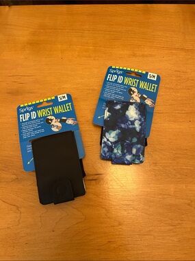 Lot of 2 Sprigs Black and Floral Flip ID Wrist Wallets NEW